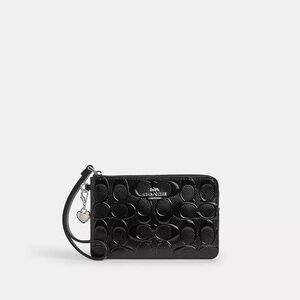 Coach Embossed Black Wristlet with Silver Coach Heart Charm